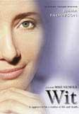 Partial face with text overlay 'Wit' on the right.