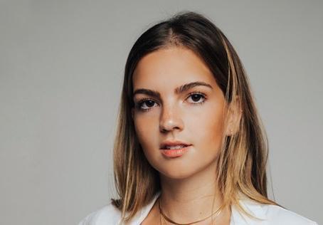 Peyton Darrow headshot image link to story