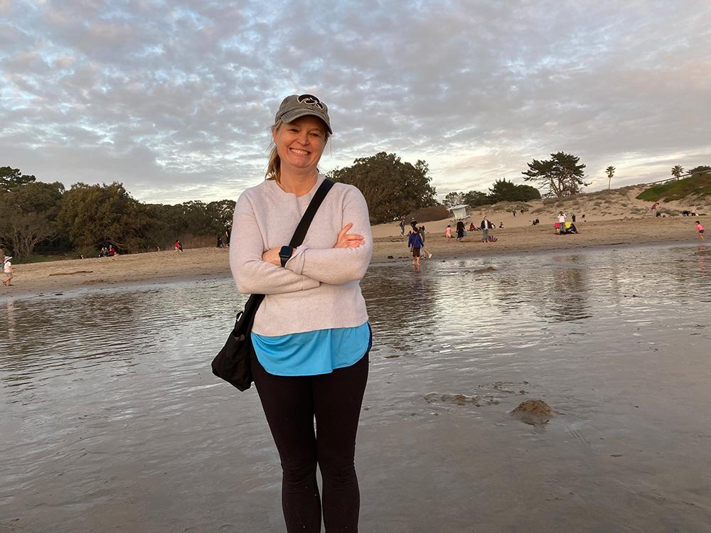 barbara obrien standing with outdoors with water and shore in the background
