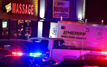 Emergency vehicles outside a massage facility in Atlanta after mass shootings in April 2021