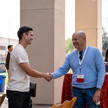 Two men shaking hands 
