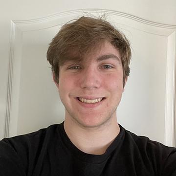 Man smiling in black tshirt