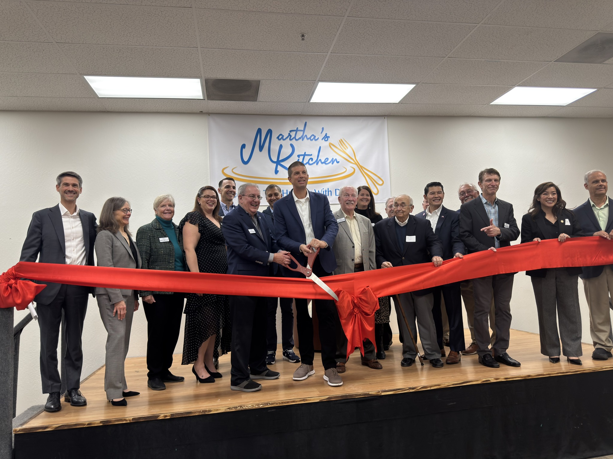 Ribbon Cutting at the Grand Opening of Marthas Kitchen Food Hub  - Photo source Marthas Kitchen Facebook page.